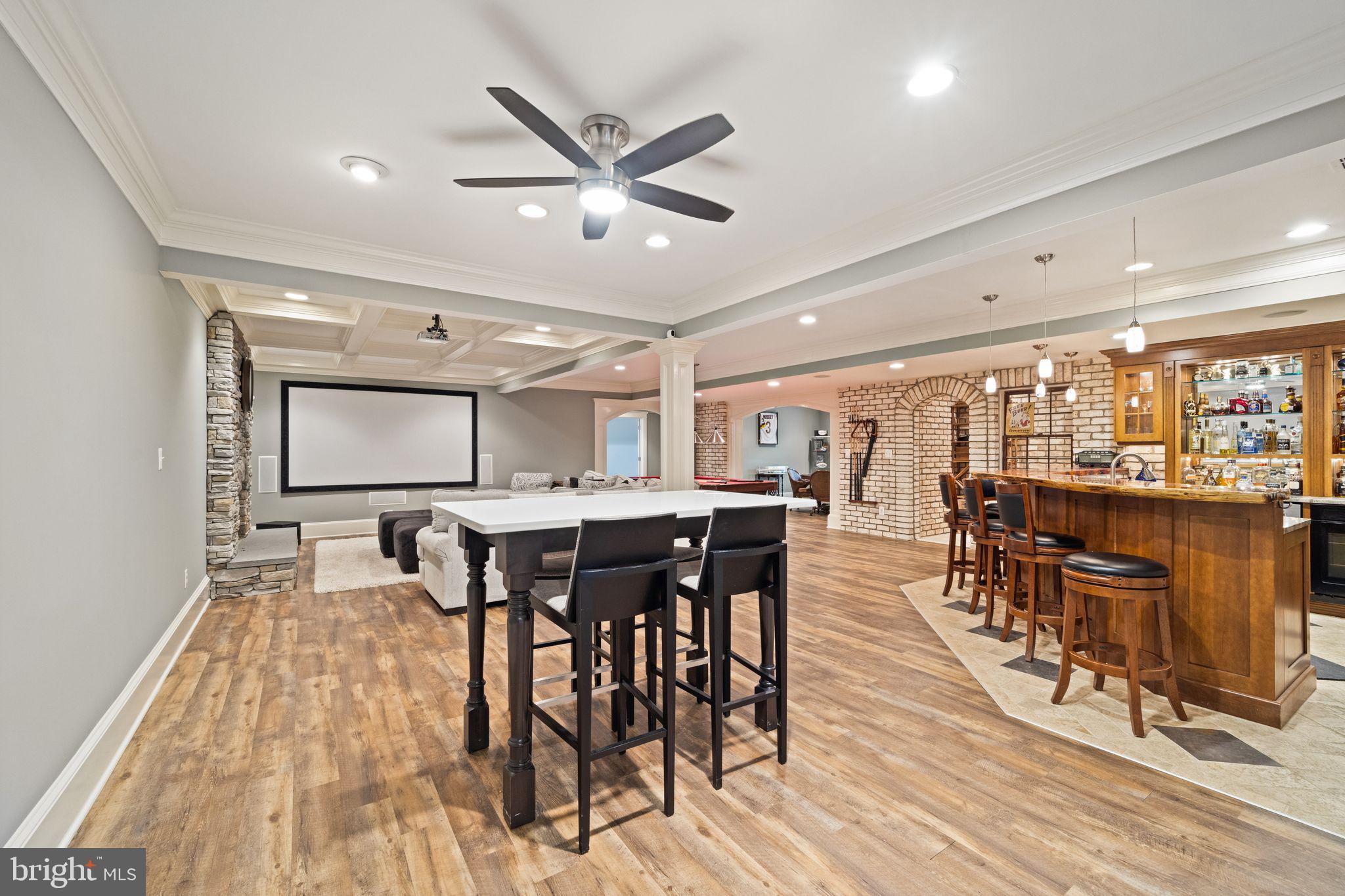 42834 Waxpool Road Ashburn, VA 20148 - Photo 64 of 128 Entertainer's dream basement, LVP wood grain floor