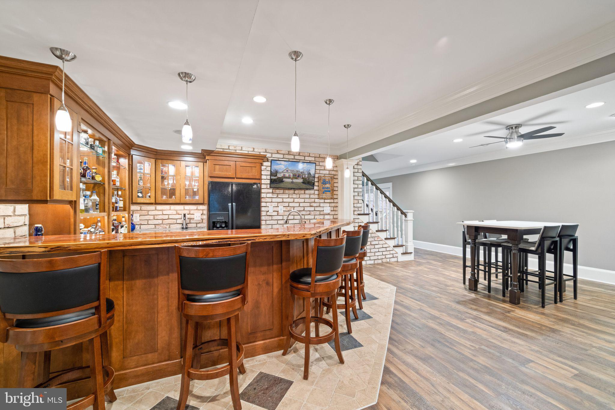 42834 Waxpool Road Ashburn, VA 20148 - Photo 67 of 128 Custom Red Cedar wood live edge bar top.
