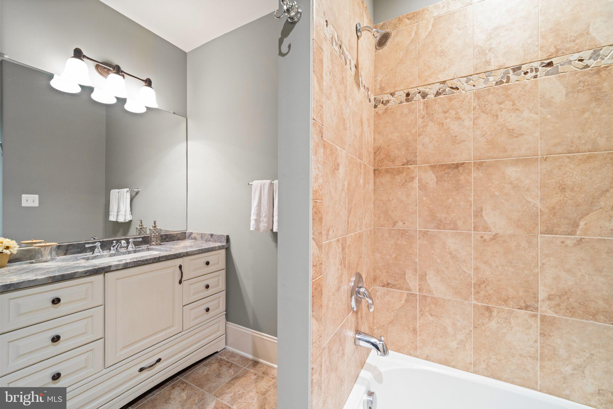 42834 Waxpool Road Ashburn, VA 20148 - Photo 75 of 128 Basement level full bathroom