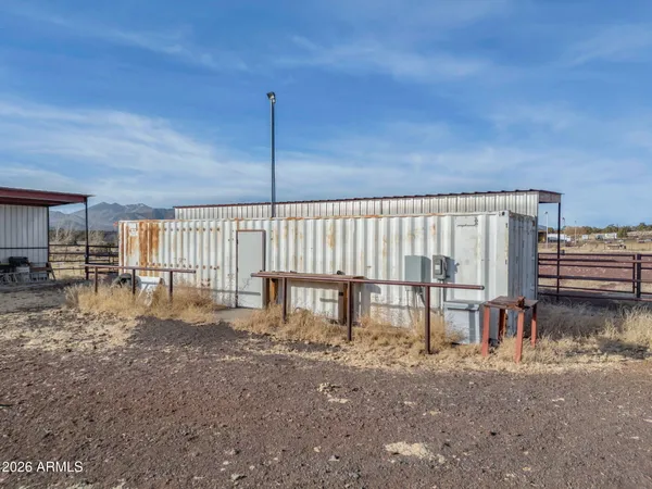 a view of a porch with chairs