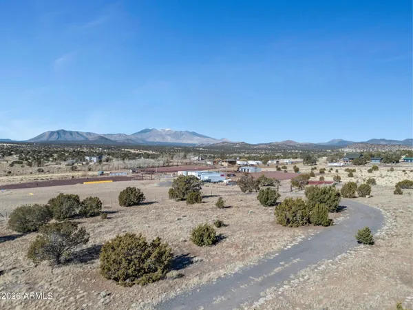 a view of a lake with mountain