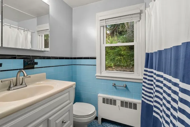 a view of a glass door and a yard