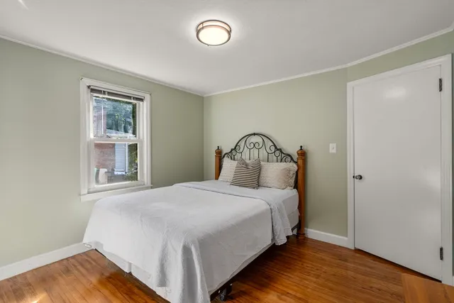 a view of a hallway with washer and dryer