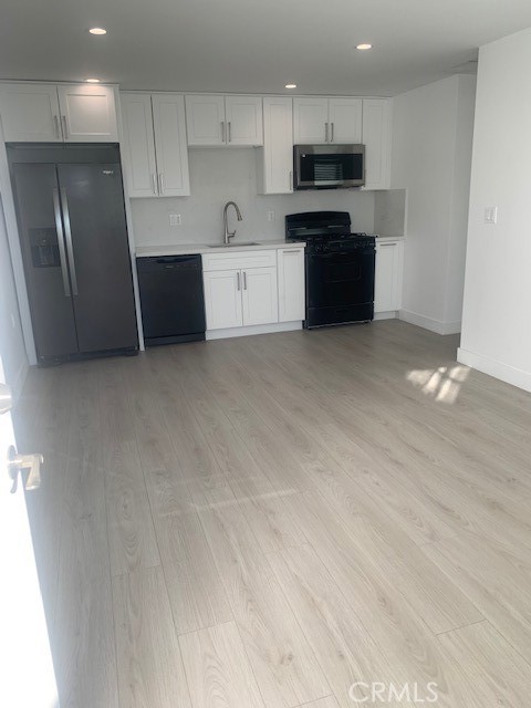 11519 Balboa Boulevard Granada Hills, CA 91344 - Photo 19 of 19 open floor plan showing kitchen