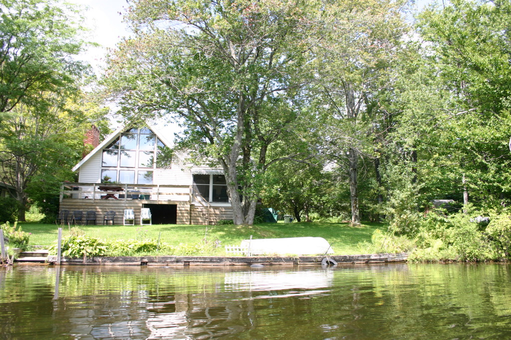 70 Tyringham Road Monterey, MA 01245 - Photo 18 of 22 a view of house with swimming pool and yard with green space