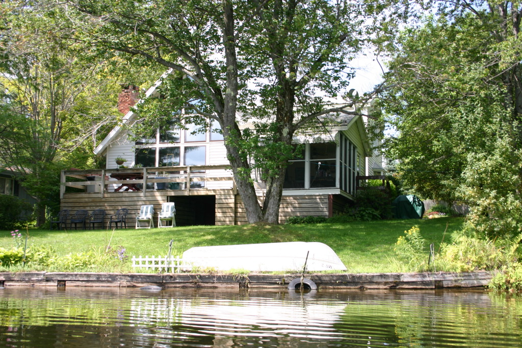 70 Tyringham Road Monterey, MA 01245 - Photo 3 of 22 a swimming pool with outdoor seating and yard