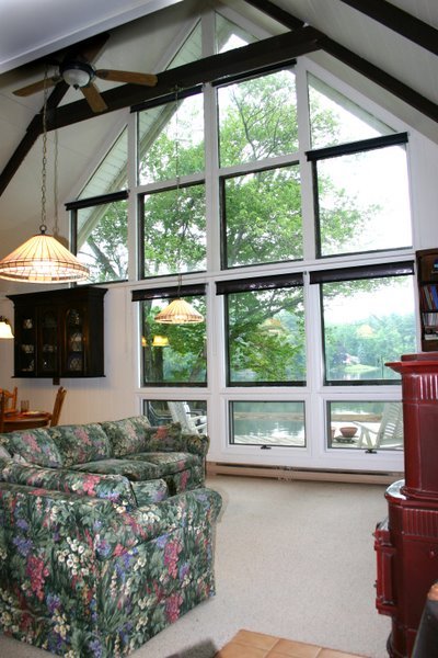 70 Tyringham Road Monterey, MA 01245 - Photo 5 of 22 a living room with furniture and a large window
