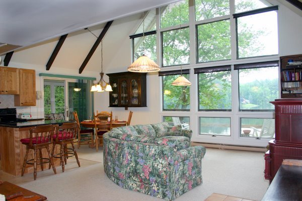 70 Tyringham Road Monterey, MA 01245 - Photo 6 of 22 a living room with furniture and a large window