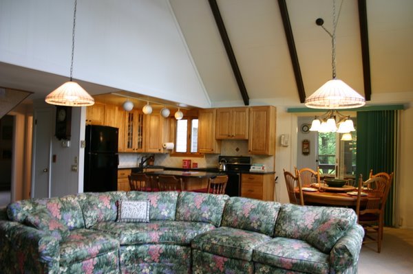 70 Tyringham Road Monterey, MA 01245 - Photo 8 of 22 a living room with furniture and a chandelier