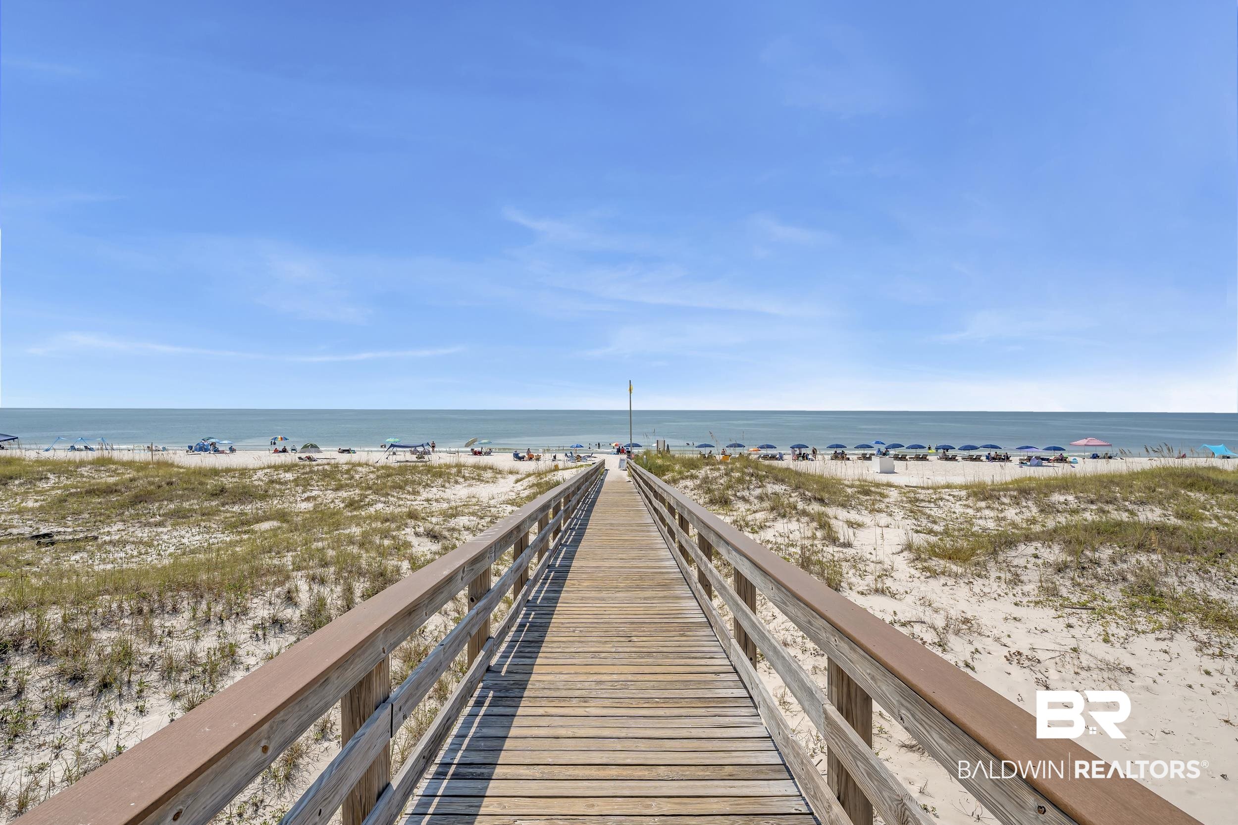 400 Plantation Road, Unit 2118 Gulf Shores, AL 36542 - Photo 44 of 59 Wooden boardwalk extending towards the ocean