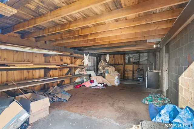 a view of an empty room with windows