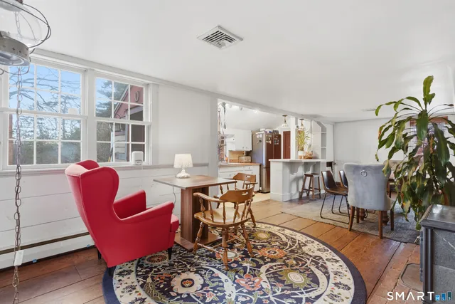 a workspace with furniture and window