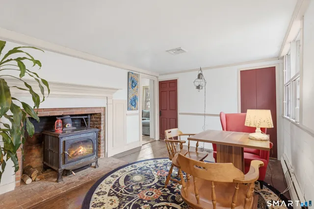 a view of a livingroom with furniture and window
