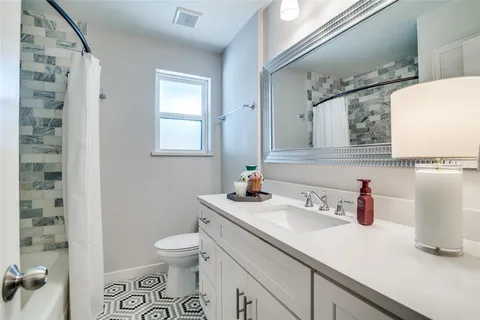 a bathroom with a sink and a toilet