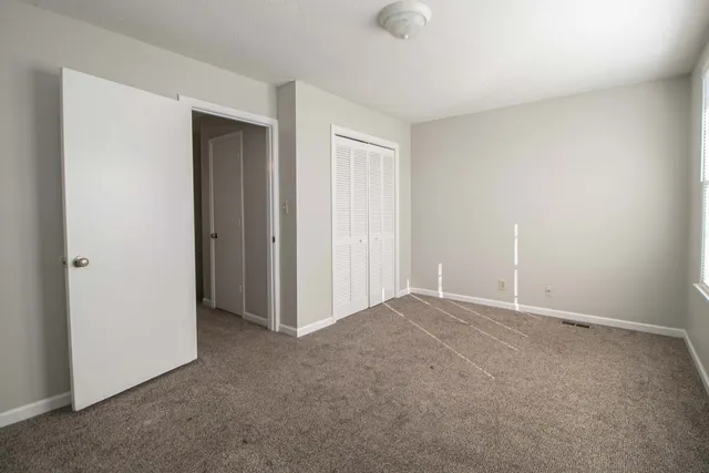 an empty room with closet