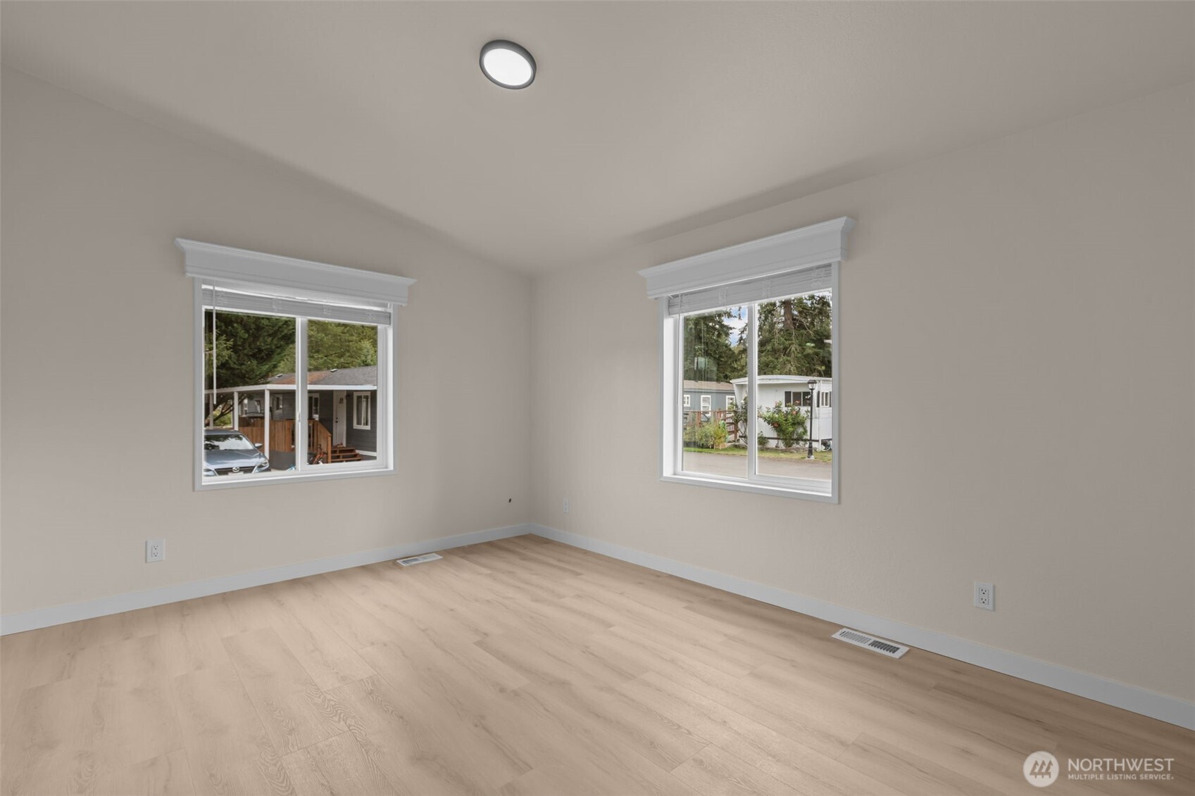 31108 3rd Avenue, Unit 301 Black Diamond, WA 98010 - Photo 16 of 37 an empty room with a window