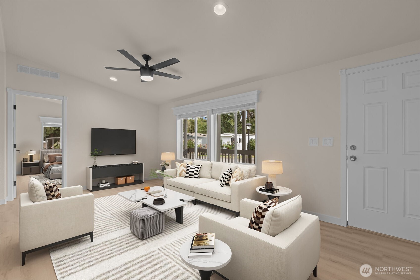 31108 3rd Avenue, Unit 301 Black Diamond, WA 98010 - Photo 6 of 37 a living room with furniture and a flat screen tv