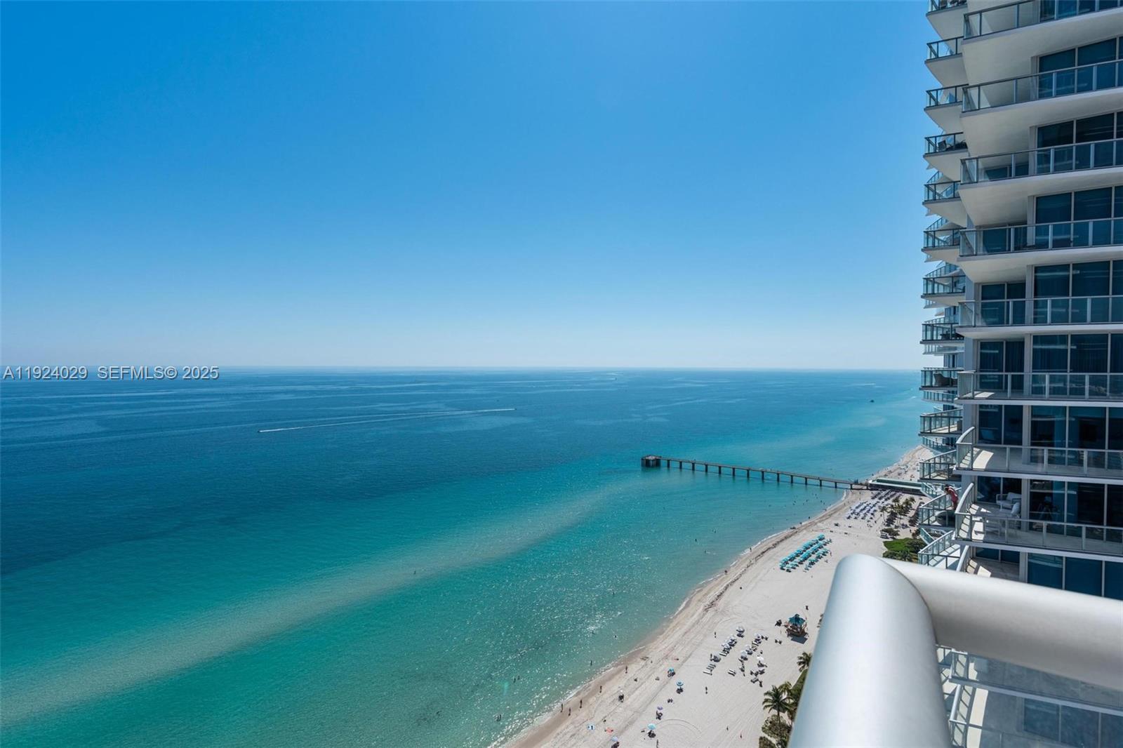 17121 Collins Avenue, Unit 3201 Sunny Isles Beach, FL 33160 - Photo 1 of 36 a view of building with ocean view