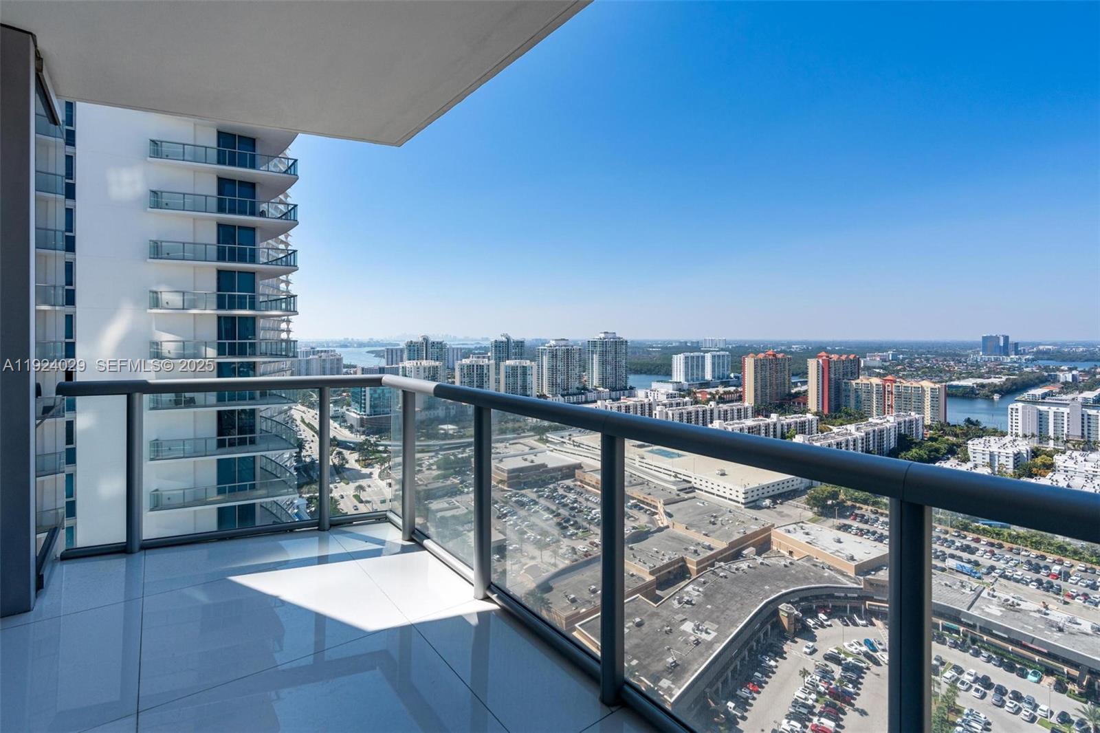 17121 Collins Avenue, Unit 3201 Sunny Isles Beach, FL 33160 - Photo 32 of 36 a view of a balcony with city view