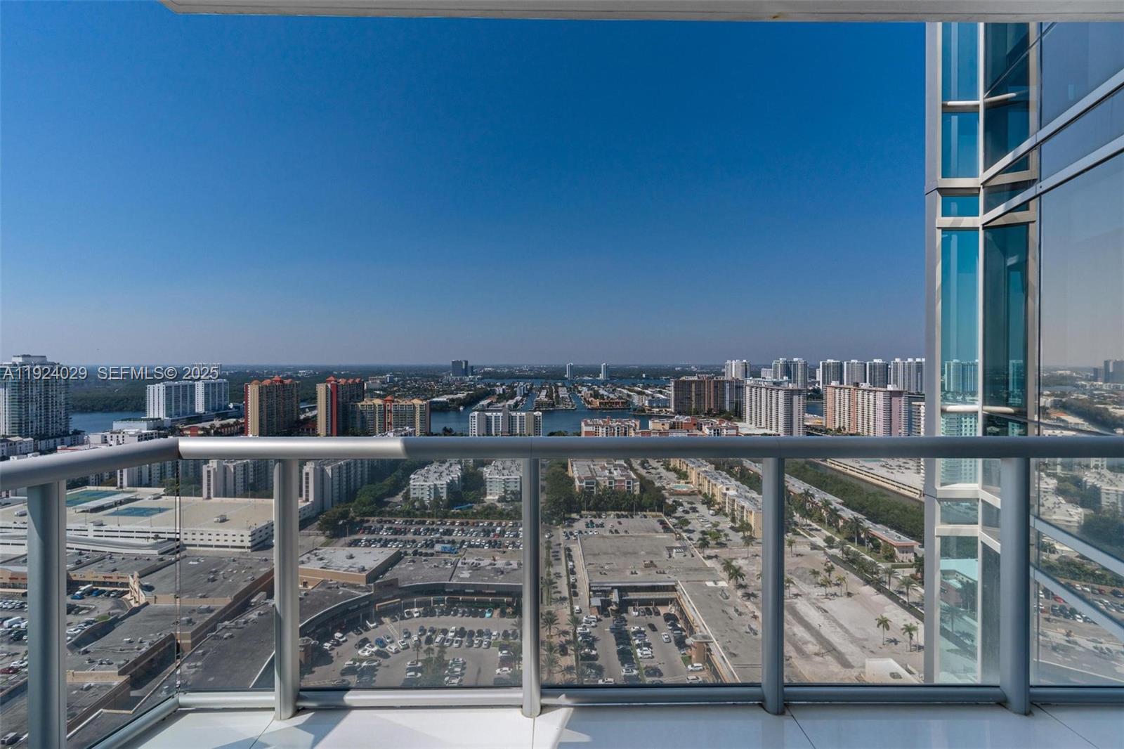 17121 Collins Avenue, Unit 3201 Sunny Isles Beach, FL 33160 - Photo 33 of 36 a view of a balcony with city view
