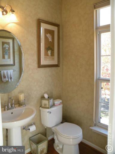 3751 Glebe Meadow Way Edgewater, MD 21037 - Photo 12 of 30 Main Level Half Bath with Hardwood