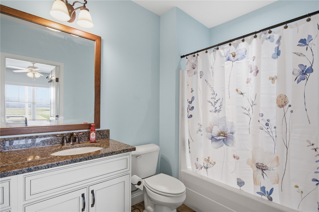 426 Oak Creek Road Seneca, SC 29678 - Photo 30 of 50 This bright bathroom features a vanity with granite counters and a clean tub/shower combination.