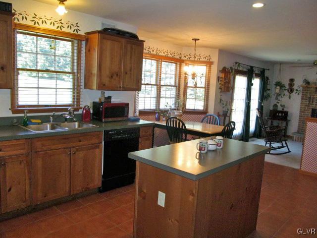 400 Heyer Mill Road Nazareth, PA 18064 - Photo 13 of 27 a kitchen with sink a counter top space and living room area