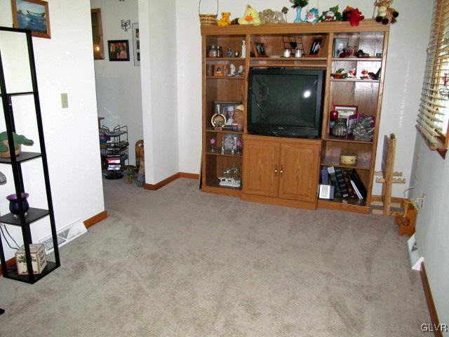 400 Heyer Mill Road Nazareth, PA 18064 - Photo 7 of 27 a view of livingroom with furniture and a flat screen tv