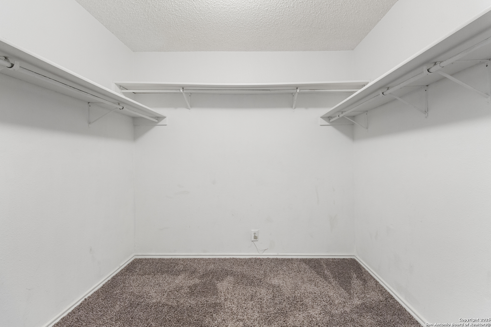 8310 Border Ridge Drive San Antonio, TX 78240 - Photo 21 of 24 a view of a room with shelf