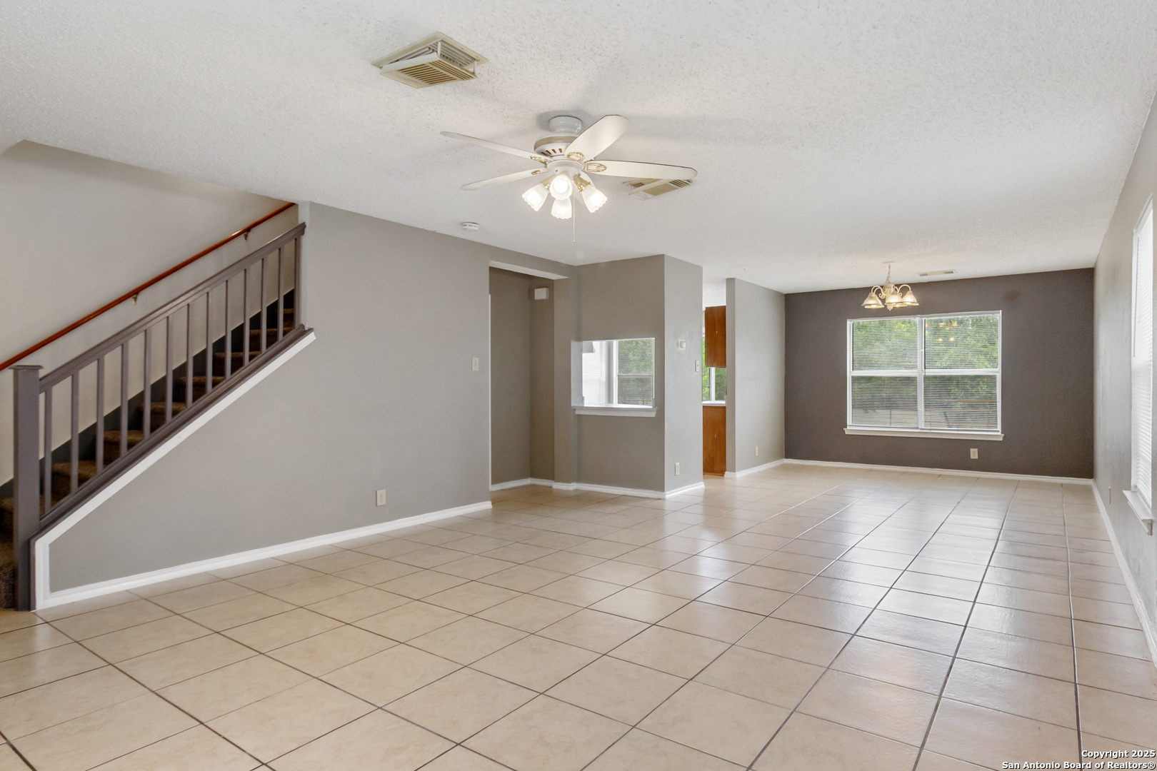 8310 Border Ridge Drive San Antonio, TX 78240 - Photo 6 of 24 a view of an empty room with a window