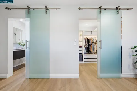 a view of a bathroom from the hallway