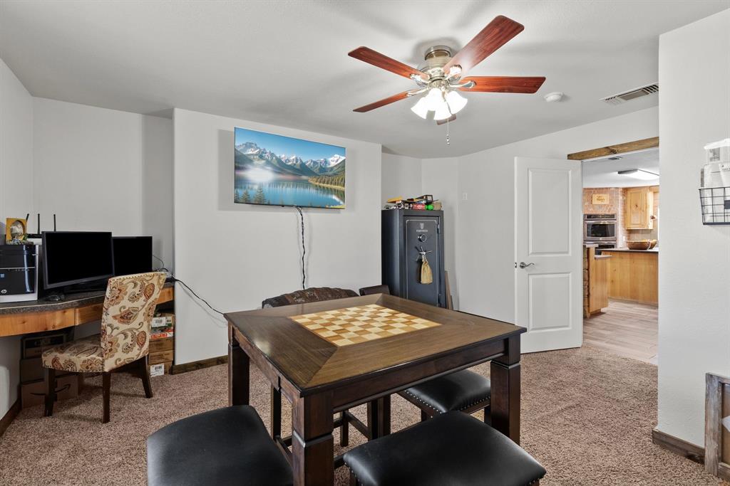 24 County Rd NW 1060 Talco, TX 75487 - Photo 24 of 40 a view of a dining room with furniture