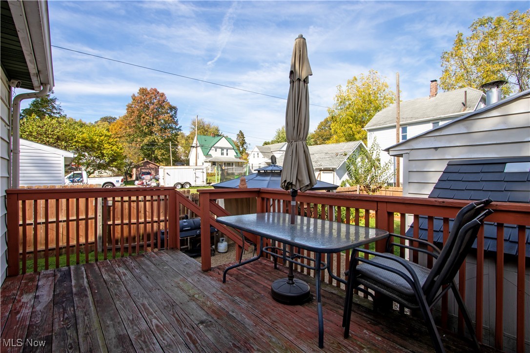 53 Grant Street Rittman, OH 44270 - Photo 8 of 34 Wooden terrace with a residential view and outdoor dining space