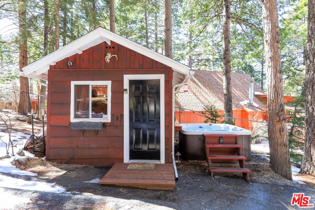 52521 Pine Ridge Road Idyllwild, CA 92549 - Photo 15 of 43 a front view of a house with a yard