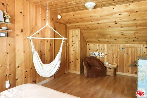 a room with furniture and a wooden floor