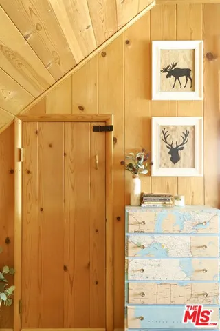 a bathroom with a shower and a sink
