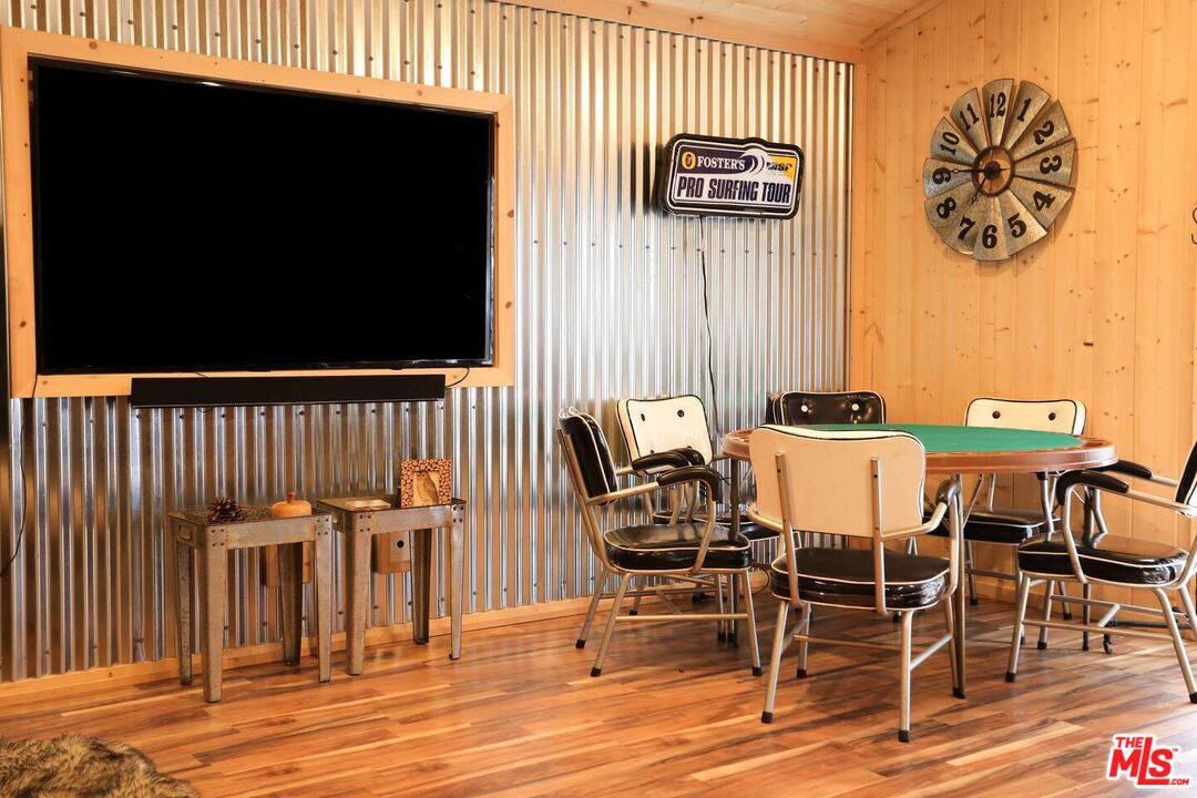 52521 Pine Ridge Road Idyllwild, CA 92549 - Photo 26 of 43 a view of a dinning table and chairs in the patio