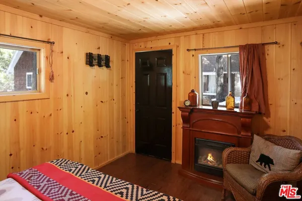 a bed room with a bed and a cabinets