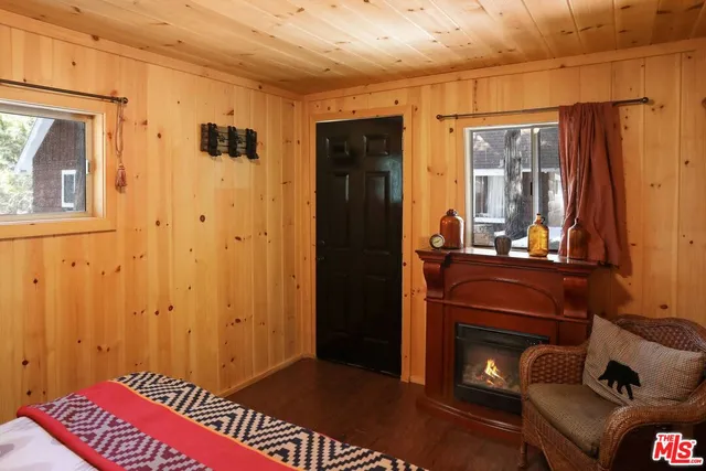 a bed room with a bed and a cabinets