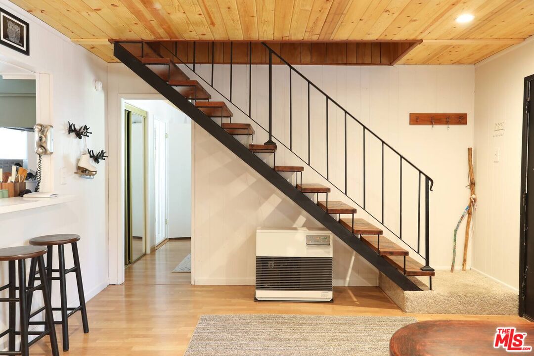 52521 Pine Ridge Road Idyllwild, CA 92549 - Photo 9 of 43 a view of entryway and hall with wooden floor