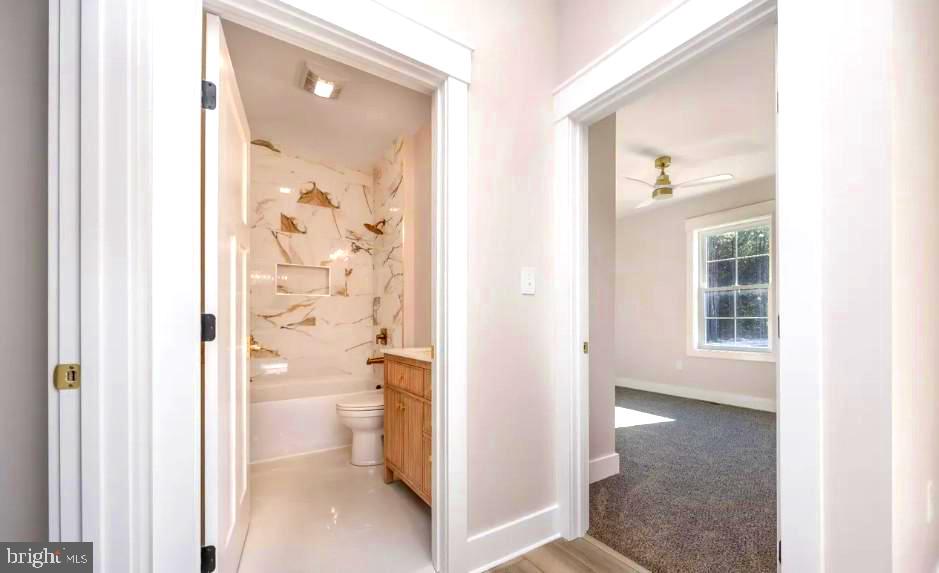 19438 Parsons Road Georgetown, DE 19947 - Photo 27 of 36 Elegant entry to modern bath and room.