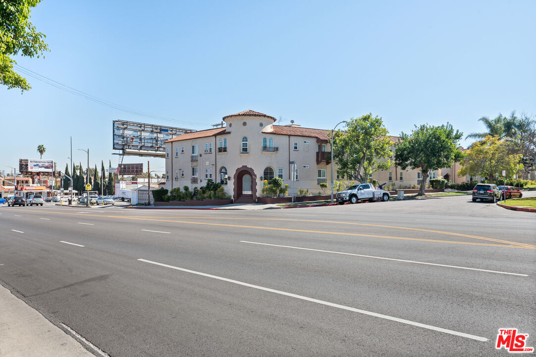 5320 West Olympic Boulevard, Unit 4 Los Angeles, CA 90036 - Photo 2 of 11 a view of street with a cars parked in front of it