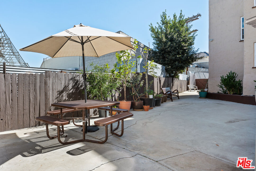 5320 West Olympic Boulevard, Unit 4 Los Angeles, CA 90036 - Photo 5 of 11 a view of a backyard with sitting area and furniture