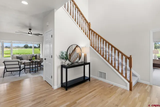 a view of entryway with wooden floor