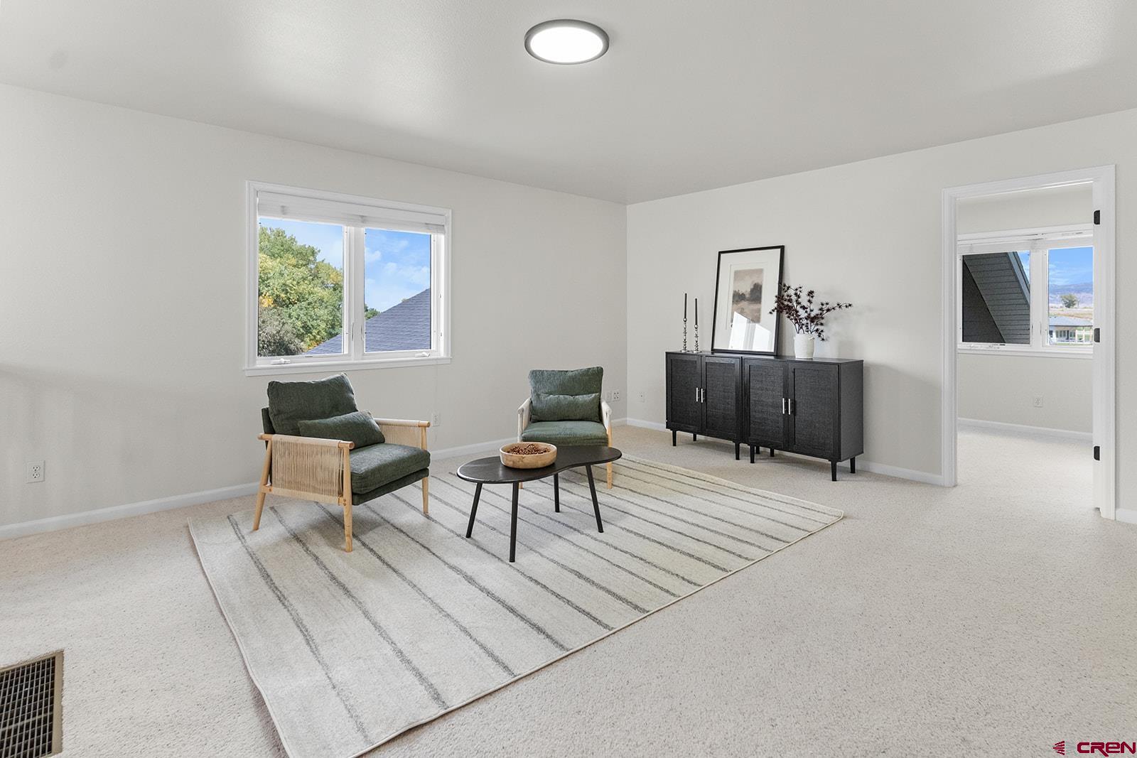 66356 Otter Road Montrose, CO 81403 - Photo 21 of 45 a living room with furniture and a window
