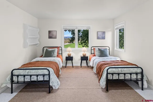 a work room with furniture and a window