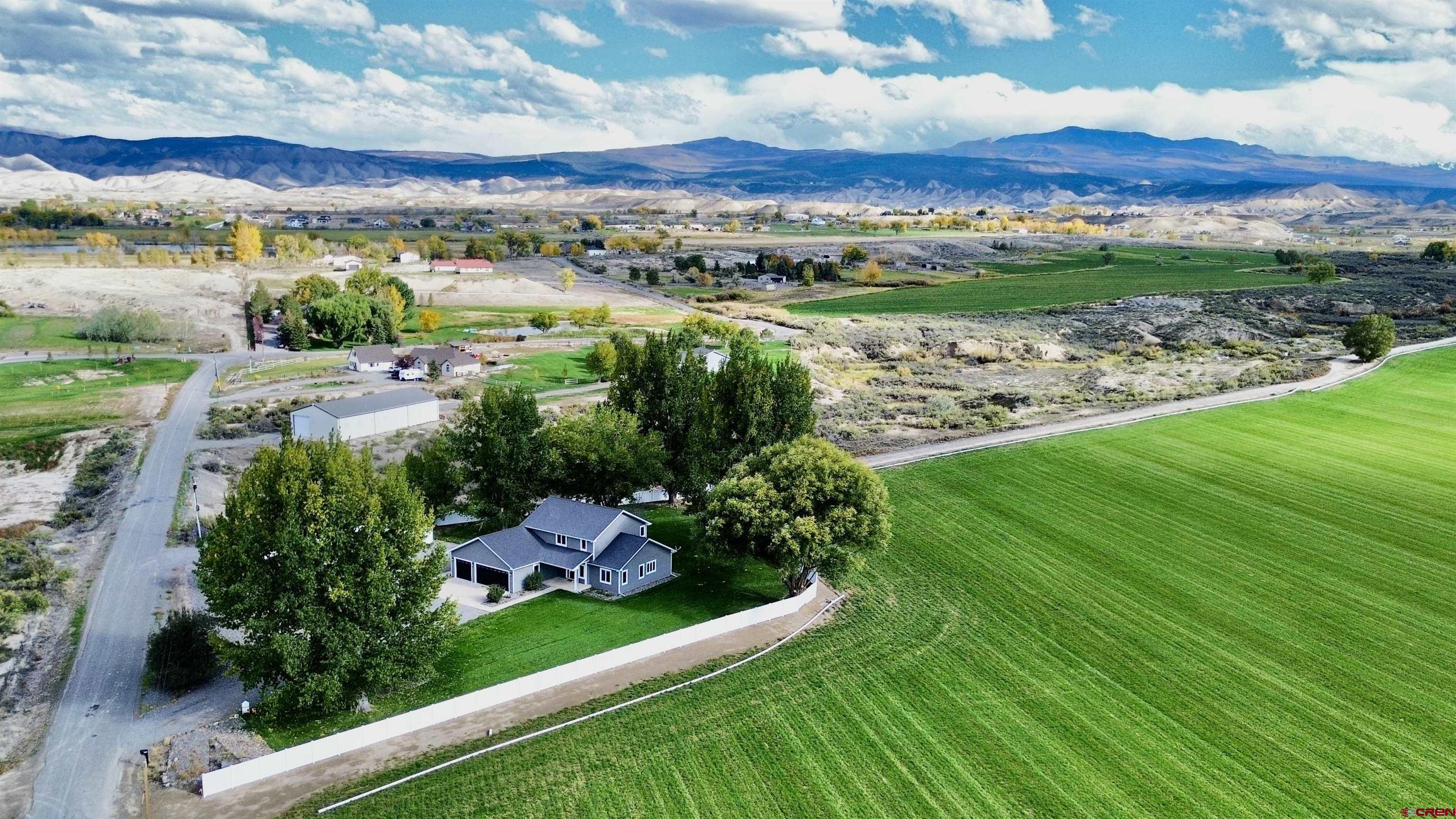 66356 Otter Road Montrose, CO 81403 - Photo 36 of 45 a view of a city with a garden