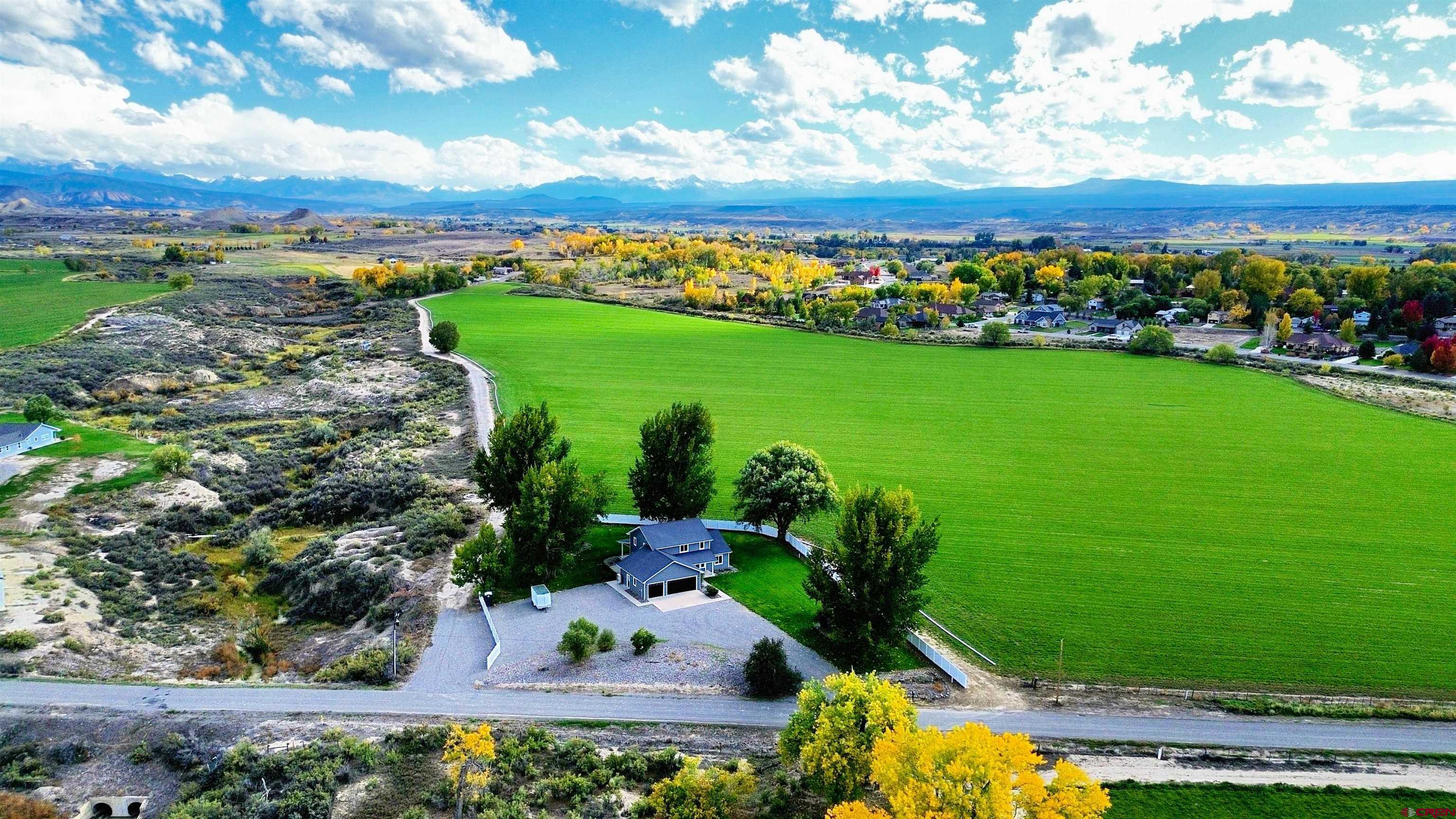 66356 Otter Road Montrose, CO 81403 - Photo 38 of 45 a view of a pathway with a garden