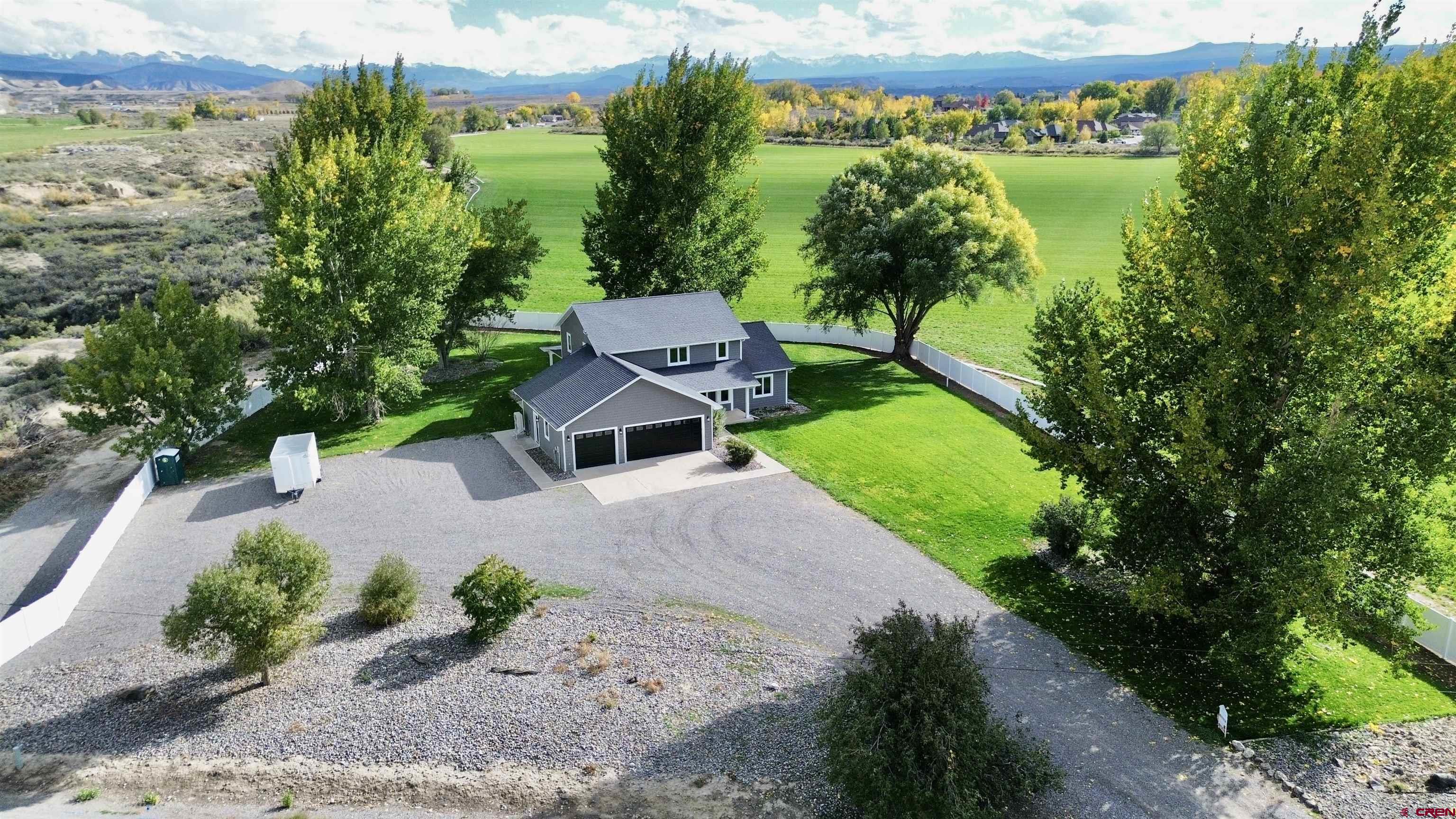 66356 Otter Road Montrose, CO 81403 - Photo 43 of 45 a view of a garden with a lake