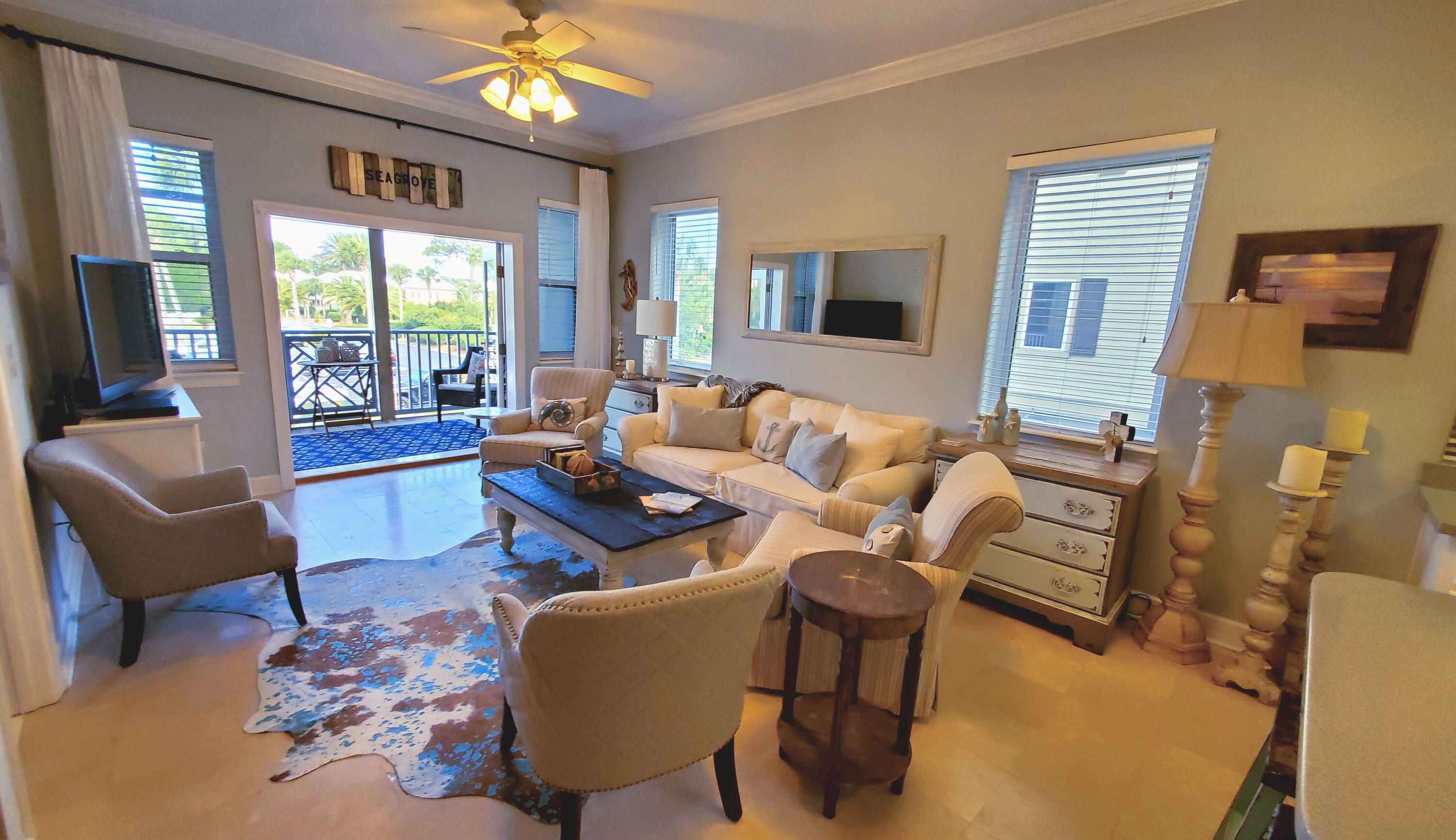 231 Somerset Bridge Road, Unit 2206 Santa Rosa Beach, FL 32459 - Photo 2 of 23 a living room with furniture fireplace and a large window